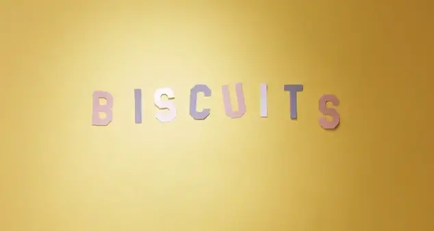 Biscuits written on a yellow background