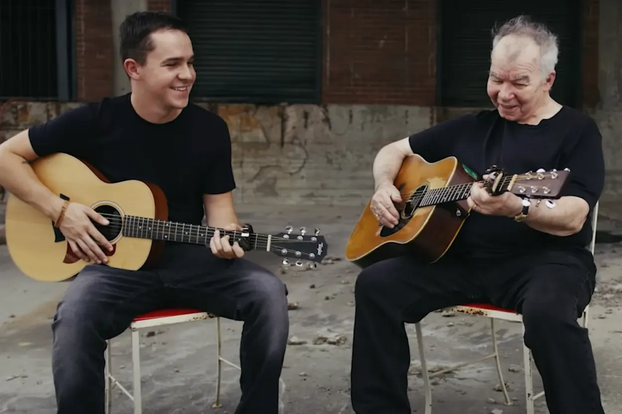A picture of John Prine with his son.