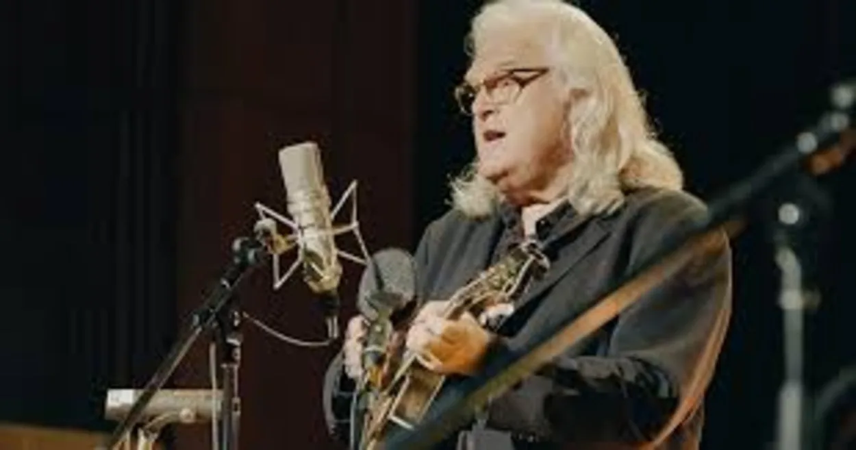 An image of Ricky Skaggs demonstrating his virtuosity on the mandolin, highlighting his instrumental skills and contribution to country music.
