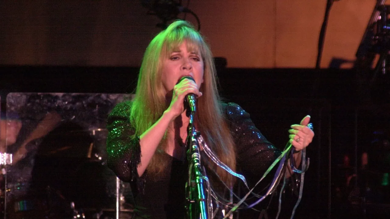 Stevie Nicks performing on stage.
