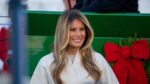 First Lady Melania Trump examines the White House Christmas Tree.