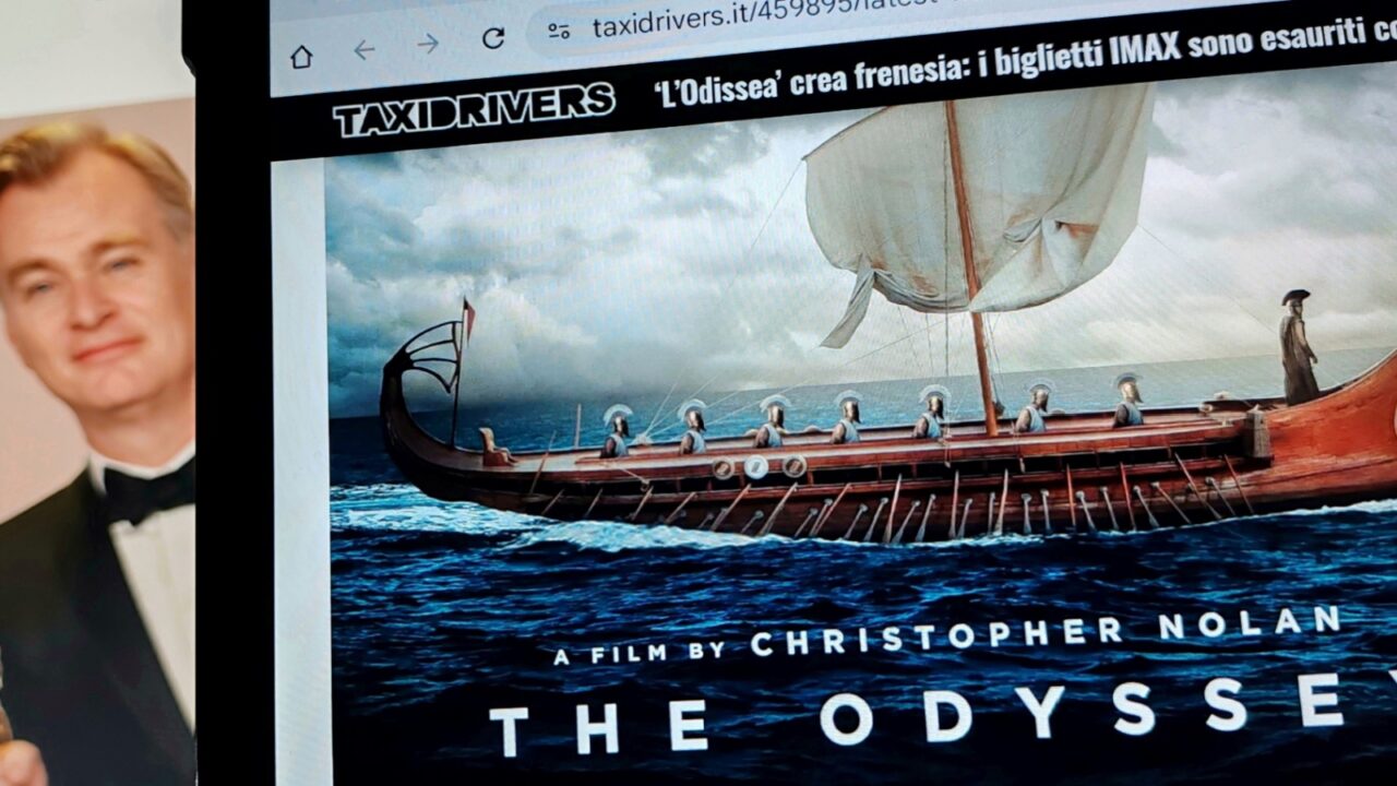 The Odyssey poster on Laptop screen. 